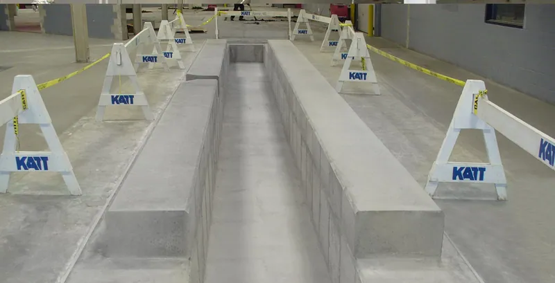 Long concrete foundation pit for the printing press at Angel Lithographing