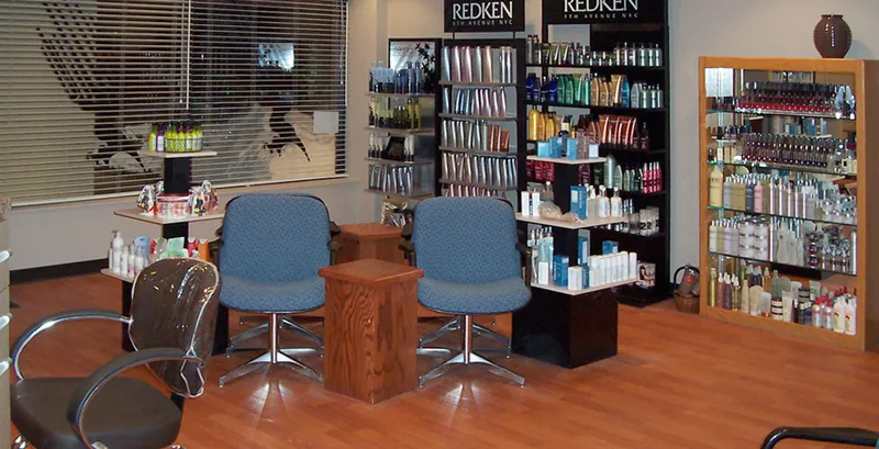 Autumn Leaf salon retail area with product shelving and waiting chairs