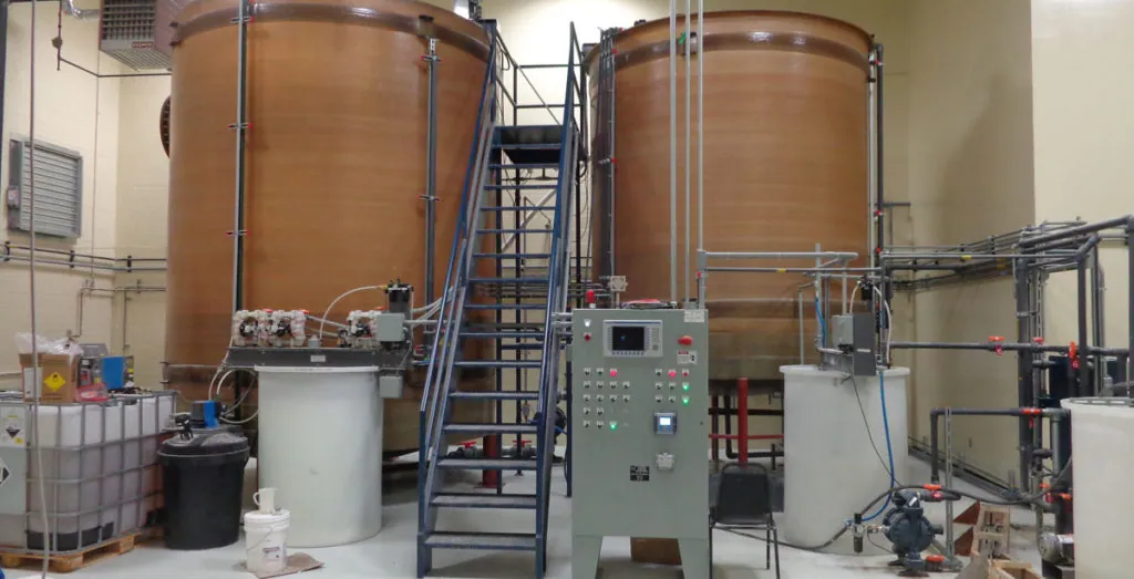 Wastewater treatment tanks, stairs and control panel at Butter Buds in Racine