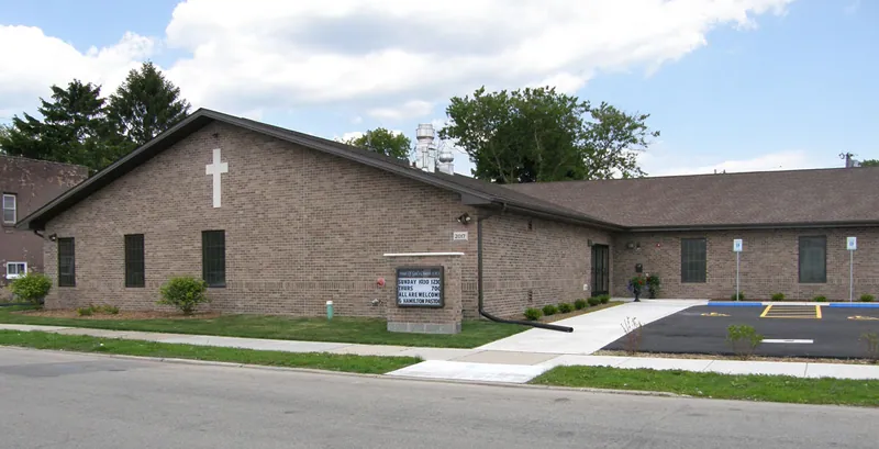 Israel of God Church front entrance with cross and sign