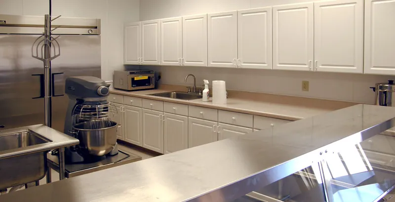 Commercial kitchen at Israel of God Church with stainless steel counters