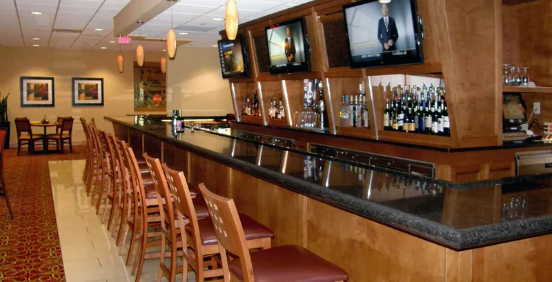 New bar at Marriott 20 & Oaks with granite countertop and wine cabinets