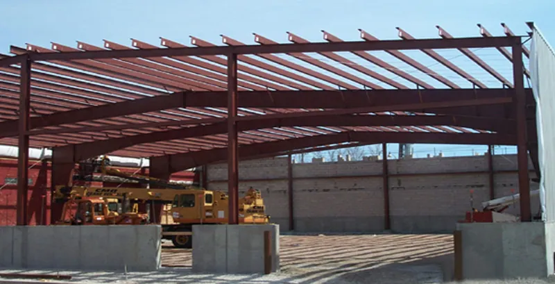 Steel roof framing of the Z & Z Machine Products addition under construction